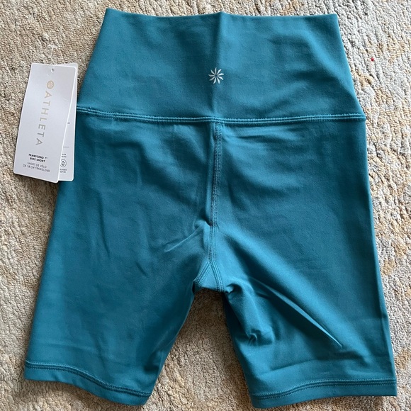 Brand NWT teal running shorts. - Picture 2 of 4